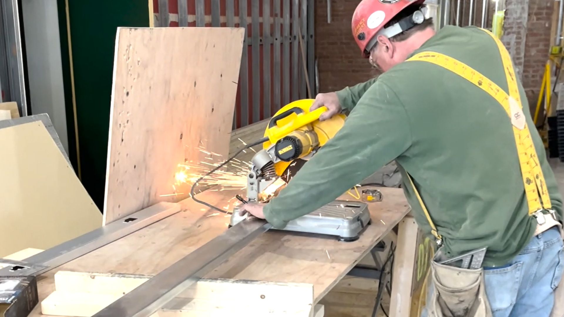 A man using a saw.